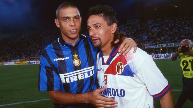 MILAN, ITALY - 1997-98: Ronaldo of FC Internazionale embraces Roberto Baggio of Bologna Fc during the Serie A match between FC Internazionale and Bologna FC in Milan, Italy.
