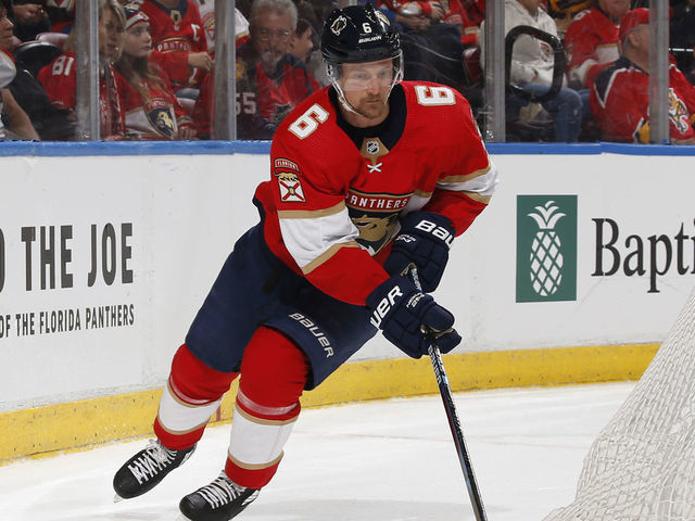 SUNRISE, FL - JANUARY 9: Anton Stralman #6 of the Florida Panthers circles the net with the puck during second period action against the Vancouver Canucks at the BB&T Center on January 9, 2020 in Sunrise, Florida. The Panthers defeated the Canucks 5-2.