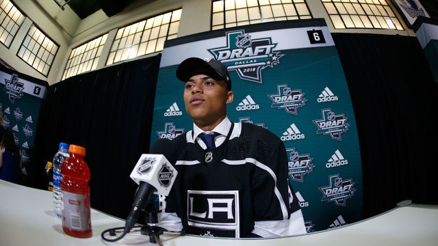 DALLAS, TX - JUNE 23: Akil Thomas answers questions from the media after being selected 51st overall by the Los Angeles Kings during the 2018 NHL Draft at American Airlines Center on June 23, 2018 in Dallas, Texas.