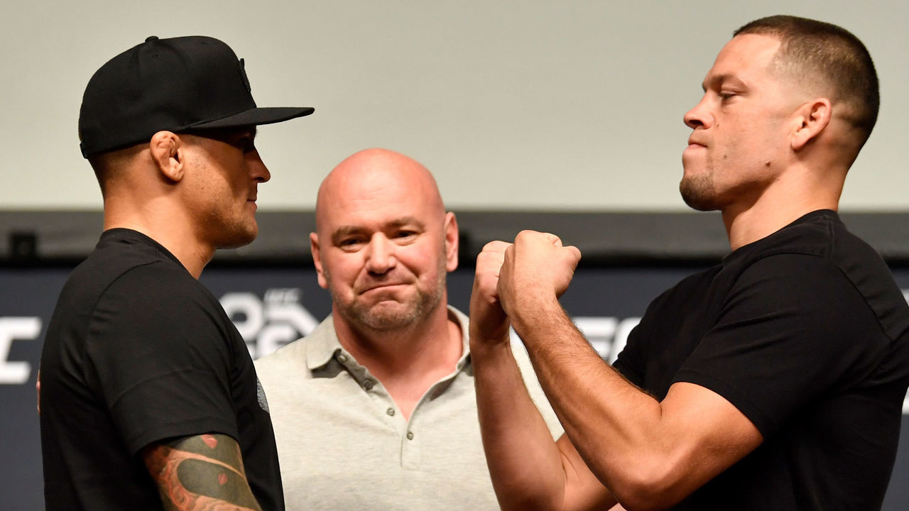 LOS ANGELES, CA - AUGUST 03: (L-R) Opponents Dustin Poirier and Nate Diaz face off during the UFC press conference inside the Orpheum Theater on August 3, 2018 in Los Angeles, California.
