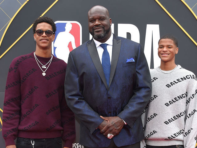 US retired basketball player Shaquille O'Neal (C) and his sons Shareef O'Neal (L) and Shaqir O'Neal (R) arrive for the 2019 NBA Awards at Barker Hangar on June 24, 2019 in Santa Monica, California.