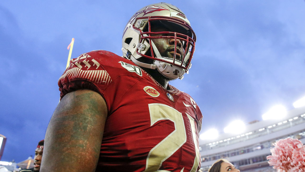 TALLAHASSEE, FL - OCTOBER 26: Defensive Tackle Marvin Wilson #21 of the Florida State Seminoles leaves the field after the game against the Syracuse Orange at Doak Campbell Stadium on Bobby Bowden Field on October 26, 2019 in Tallahassee, Florida. The Seminoles defeated the Orange 35 to 17.