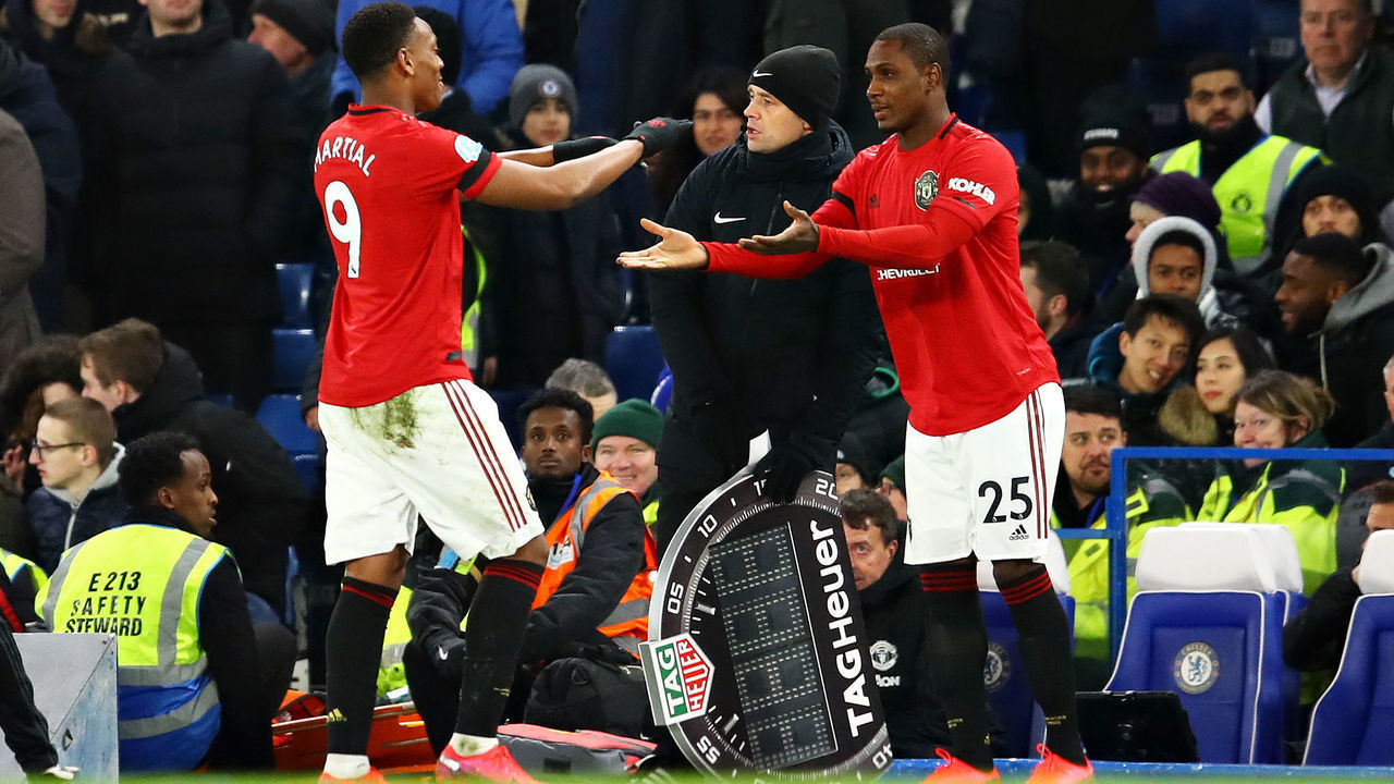 LONDON, ENGLAND - FEBRUARY 17: Odion Ighalo of Manchester United replaces teammate Anthony Martial as a substitute during the Premier League match between Chelsea FC and Manchester United at Stamford Bridge on February 17, 2020 in London, United Kingdom.