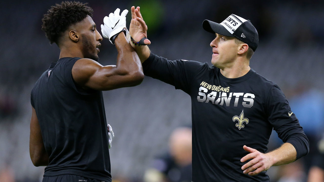NEW ORLEANS, LOUISIANA - NOVEMBER 24: Drew Brees #9 of the New Orleans Saints and Michael Thomas #13 react during a game against the Carolina Panthers at the Mercedes Benz Superdome on November 24, 2019 in New Orleans, Louisiana.