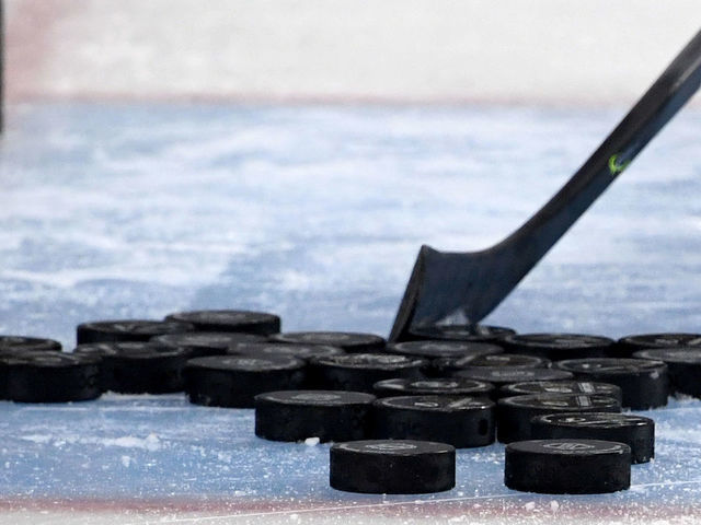 LAS VEGAS, NEVADA - FEBRUARY 20: Hockey pucks are gathered in the crease during warmups before a game between the Tampa Bay Lightning and the Vegas Golden Knights at T-Mobile Arena on February 20, 2020 in Las Vegas, Nevada. The Golden Knights defeated the Lightning 5-3.