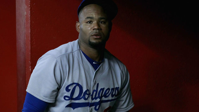 PHOENIX, AZ - SEPTEMBER 12: Carl Crawford #3 of the Los Angeles Dodgers looks on from the dugout during the first inning of a MLB game against the Arizona Diamondbacks at Chase Field on September 12, 2015 in Phoenix, Arizona. The Dodgers defeated the Diamondbacks 9-5.