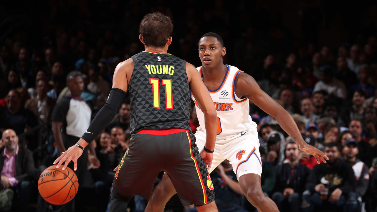 NEW YORK, NY - OCTOBER 16: RJ Barrett #9 of the New York Knicks plays defense against Trae Young #11 of the Atlanta Hawks during a pre-season game on October 16, 2019 at Madison Square Garden in New York City, New York. Mandatory Copyright Notice: Copyright 2019 NBAE