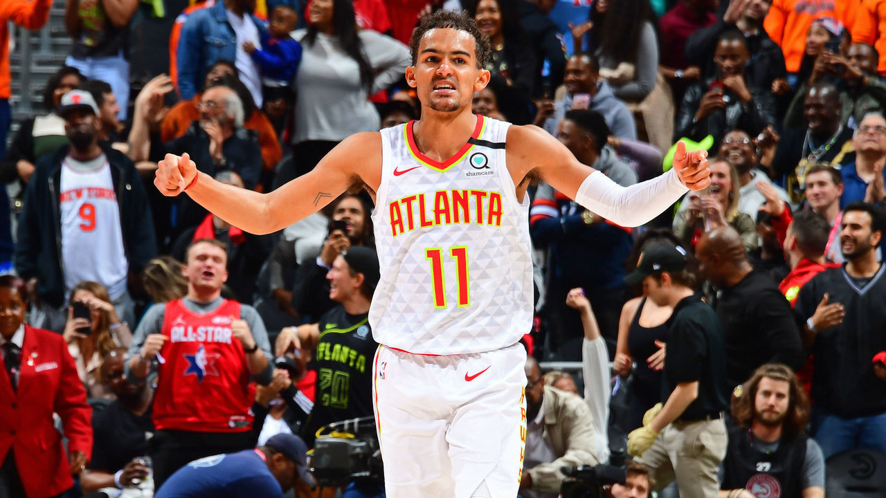 ATLANTA, GA - MARCH 11: Trae Young #11 of the Atlanta Hawks reacts to play on March 11, 2020 at State Farm Arena in Atlanta, Georgia. NOTE TO USER: User expressly acknowledges and agrees that, by downloading and/or using this Photograph, user is consenting to the terms and conditions of the Getty Images License Agreement. Mandatory Copyright Notice: Copyright 2020 NBAE