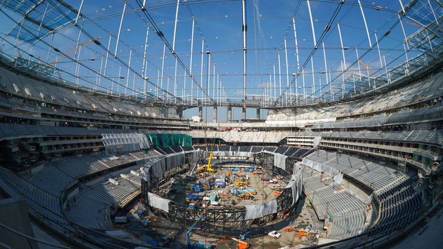 INGLEWOOD, CA - JANUARY 22: The giant Oculus 2-sided video board is being assembled inside on the floor of SoFi Stadium as roofing panels begin to cover the entire structure as it nears completion in Inglewood on Wednesday, Jan. 22, 2020. The stadium will open in the summer.
