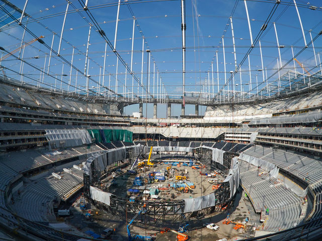 INGLEWOOD, CA - JANUARY 22: The giant Oculus 2-sided video board is being assembled inside on the floor of SoFi Stadium as roofing panels begin to cover the entire structure as it nears completion in Inglewood on Wednesday, Jan. 22, 2020. The stadium will open in the summer.