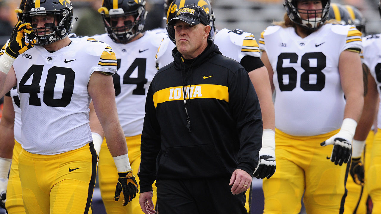 CHAMPAIGN, IL - NOVEMBER 17: Iowa Hawkeyes strength and conditioning coach Chris Doyle walks on to the field with the team for pre-game warm ups the Big Ten Conference college football game between the Iowa Hawkeyes and the Illinois Fighting Illini on November 17, 2018, at Memorial Stadium in Champaign, Illinois.