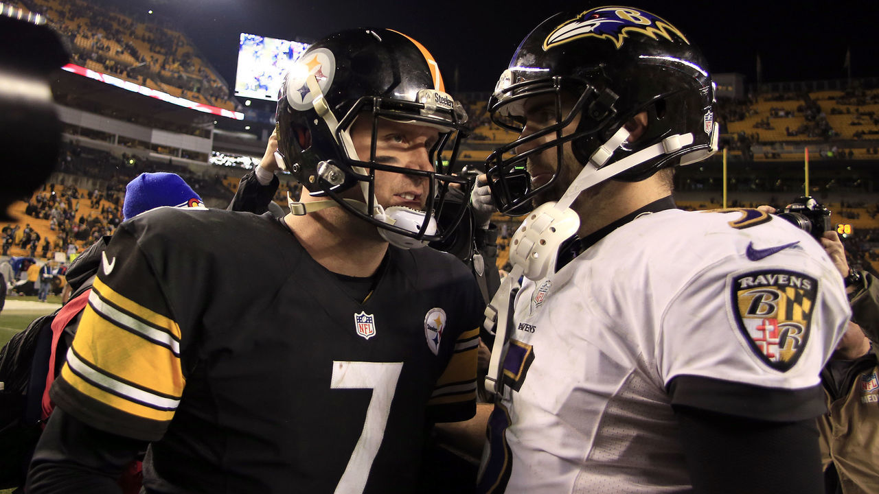 PITTSBURGH, PA - JANUARY 03: Joe Flacco #5 of the Baltimore Ravens and Ben Roethlisberger #7 of the Pittsburgh Steelers shake hands after the Wild Card game on January 3, 2015 at Heinz Field in Pittsburgh, Pennsylvania.