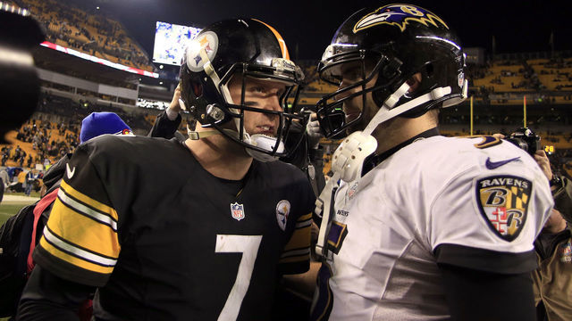 PITTSBURGH, PA - JANUARY 03: Joe Flacco #5 of the Baltimore Ravens and Ben Roethlisberger #7 of the Pittsburgh Steelers shake hands after the Wild Card game on January 3, 2015 at Heinz Field in Pittsburgh, Pennsylvania.