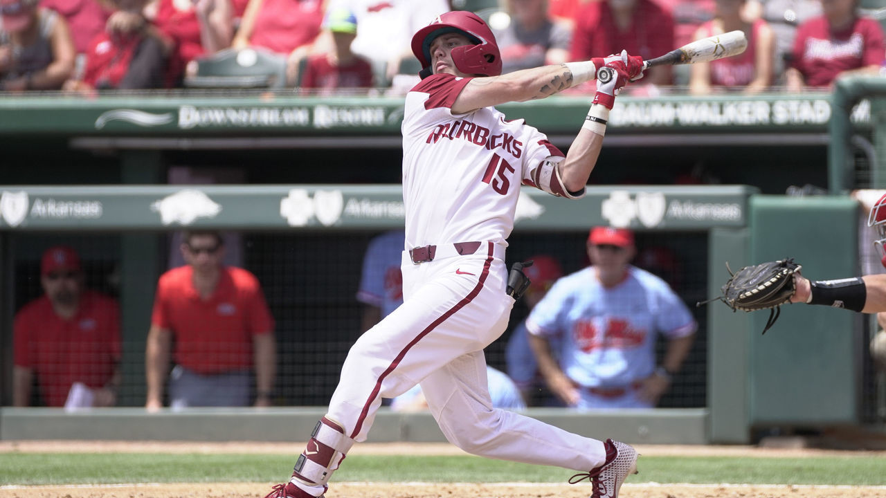 FAYETTEVILLE, AR - JUNE 08: Arkansas Razorbacks infielder Casey Martin (15) at bat during the NCAA Super Regional baseball game between the Arkansas Razorbacks and Ole Miss Rebels on June 8, 2019 at Baum Stadium in Fayetteville, AR.