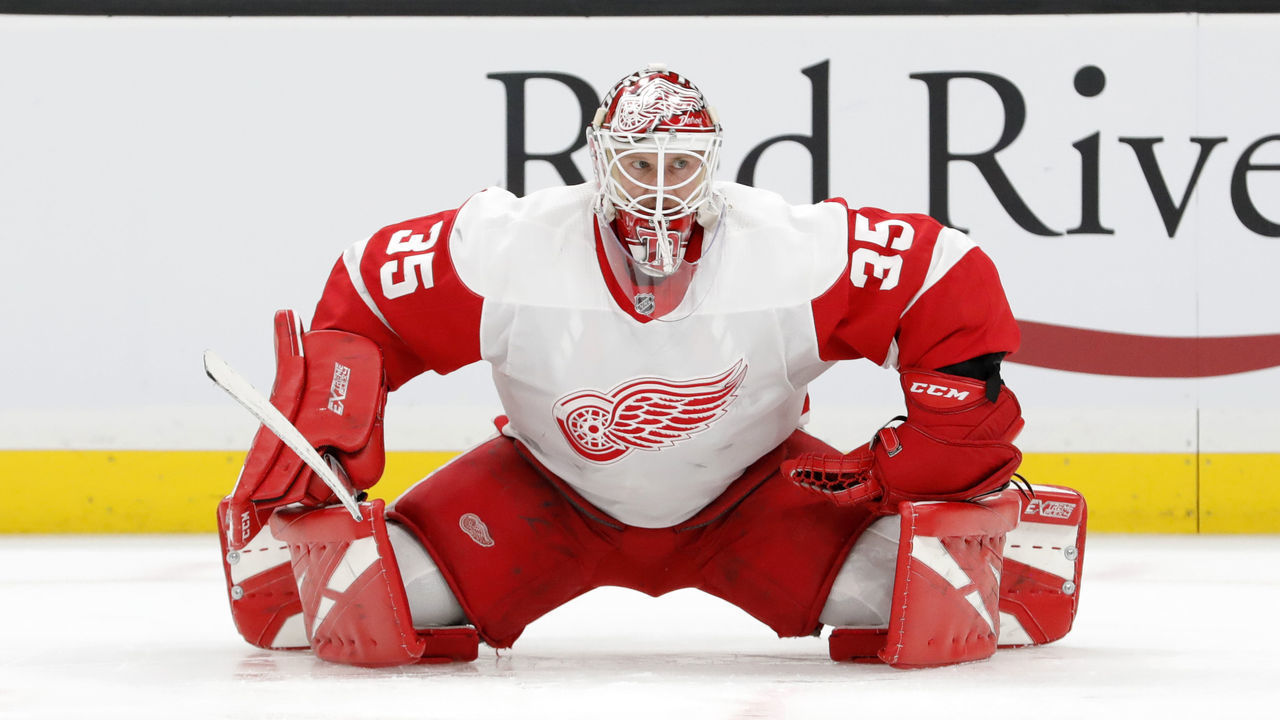 BOSTON, MA - FEBRUARY 15: Detroit Red Wings goalie Jimmy Howard (35) stretches in warm up before a game between the Boston Bruins and the Detroit Red Wings on February 15, 2020, at TD Garden in Boston, Massachusetts.