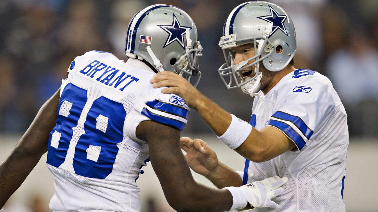 ARLINGTON, TX - OCTOBER 23: Quarterback Tony Romo #9 and Dez Bryant #88 of the Dallas Cowboys warm up before a game against the St. Louis Rams at the Cowboy Stadium on October 23, 2011 in Arlington, Texas. The Cowboys defeated the Rams 34 to 7.