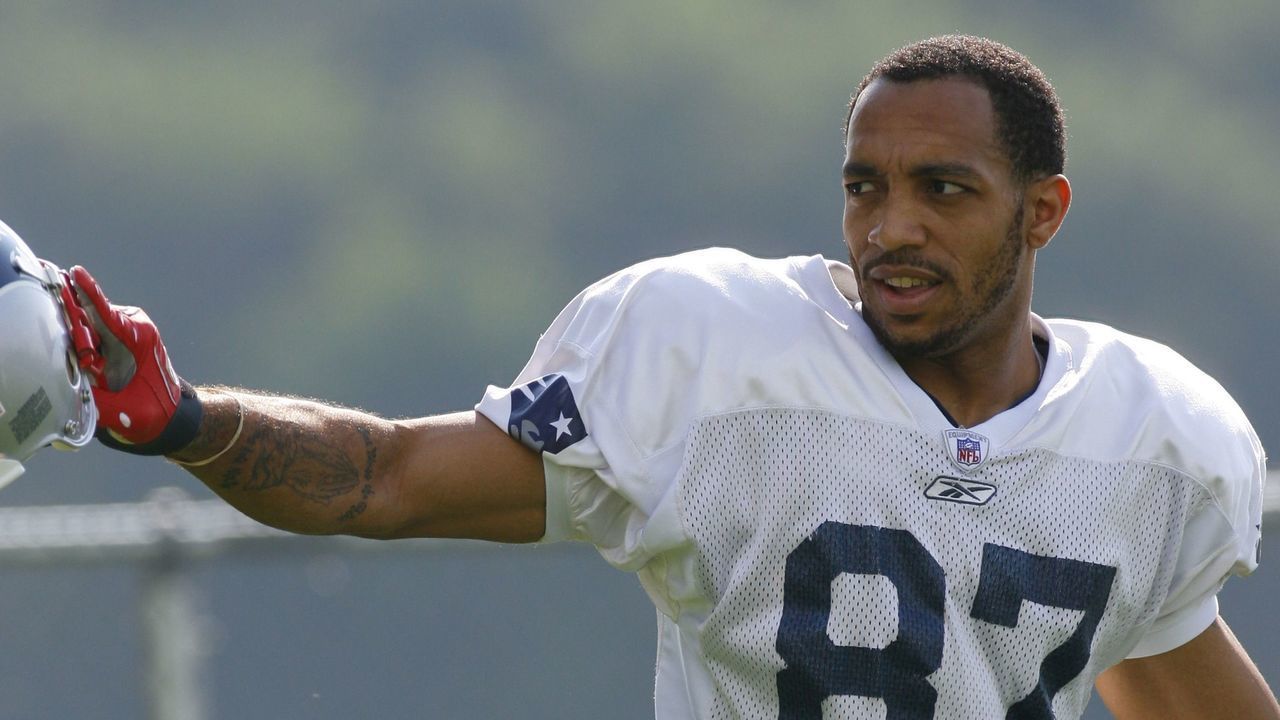 FOXBORO, MA - JULY 27: Wide receiver Reche Caldwell #87 of the New England Patriots reacts to fans during training camp practice on July 27, 2007 at Gillette Stadium in Foxboro, Massachusetts.