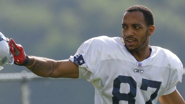 FOXBORO, MA - JULY 27: Wide receiver Reche Caldwell #87 of the New England Patriots reacts to fans during training camp practice on July 27, 2007 at Gillette Stadium in Foxboro, Massachusetts.