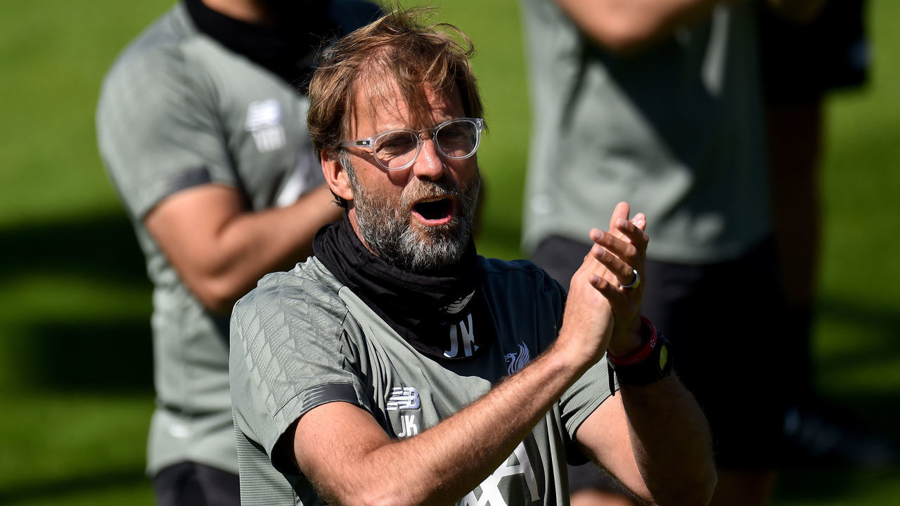 LIVERPOOL, ENGLAND - MAY 30: (THE SUN OUT, THE SUN ON SUNDAY OUT) Jurgen Klopp manager of Liverpool singing Happy Birthday to former Liverpool players Steven Gerrard during a training session at Melwood Training Ground on May 30, 2020 in Liverpool, England.