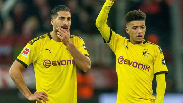 LEVERKUSEN, GERMANY - FEBRUARY 08: (BILD ZEITUNG OUT) Emre Can of Borussia Dortmund and Jadon Sancho of Borussia Dortmund looks on during the Bundesliga match between Bayer 04 Leverkusen and Borussia Dortmund at BayArena on February 8, 2020 in Leverkusen, Germany.