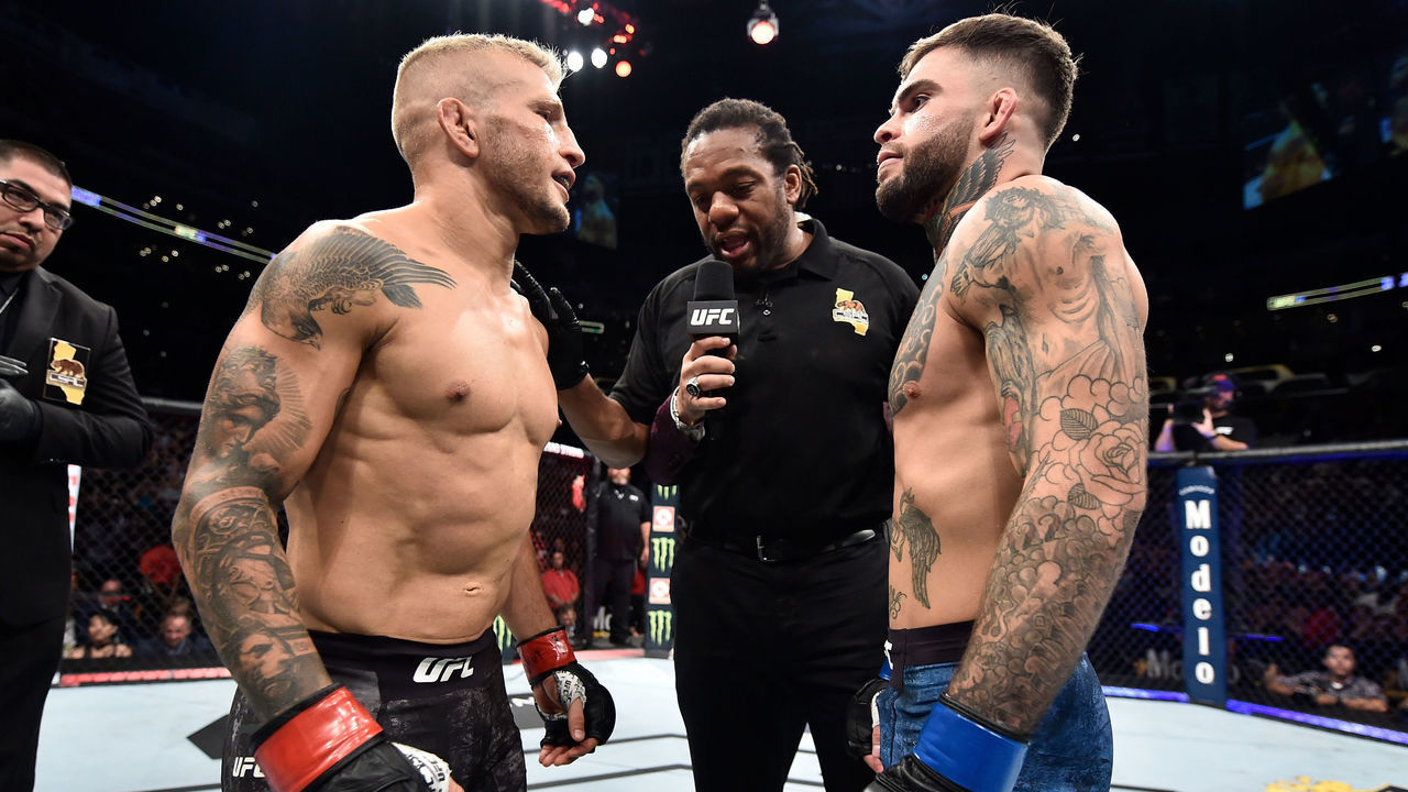 LOS ANGELES, CA - AUGUST 04: (L-R) Opponents TJ Dillashaw and Cody Garbrandt face off prior to their UFC bantamweight championship fight during the UFC 227 event inside Staples Center on August 4, 2018 in Los Angeles, California.