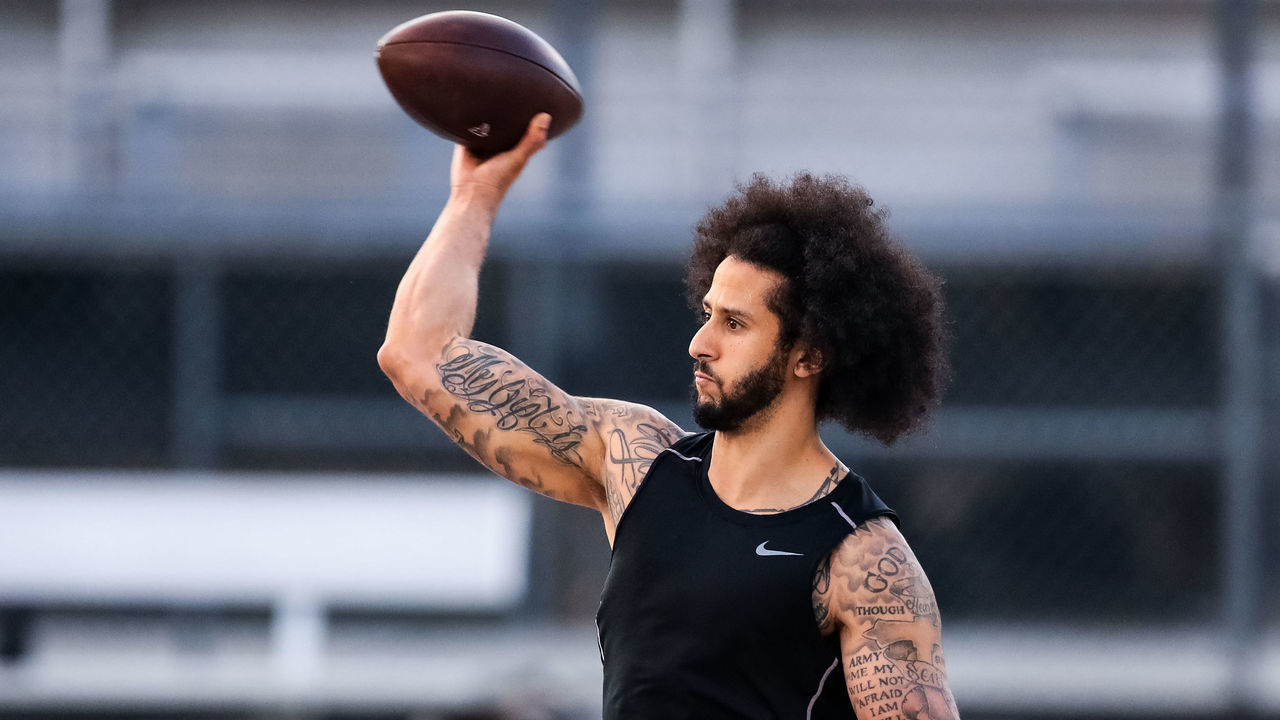RIVERDALE, GA - NOVEMBER 16: Colin Kaepernick looks to pass during his NFL workout held at Charles R Drew high school on November 16, 2019 in Riverdale, Georgia.