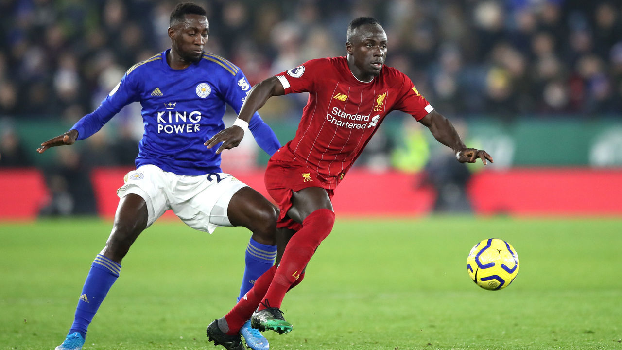 LEICESTER, ENGLAND - DECEMBER 26: Sadio Mane of Liverpool runs past Wilfred Ndidi of Leicester City during the Premier League match between Leicester City and Liverpool FC at The King Power Stadium on December 26, 2019 in Leicester, United Kingdom.