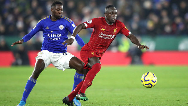 LEICESTER, ENGLAND - DECEMBER 26: Sadio Mane of Liverpool runs past Wilfred Ndidi of Leicester City during the Premier League match between Leicester City and Liverpool FC at The King Power Stadium on December 26, 2019 in Leicester, United Kingdom.