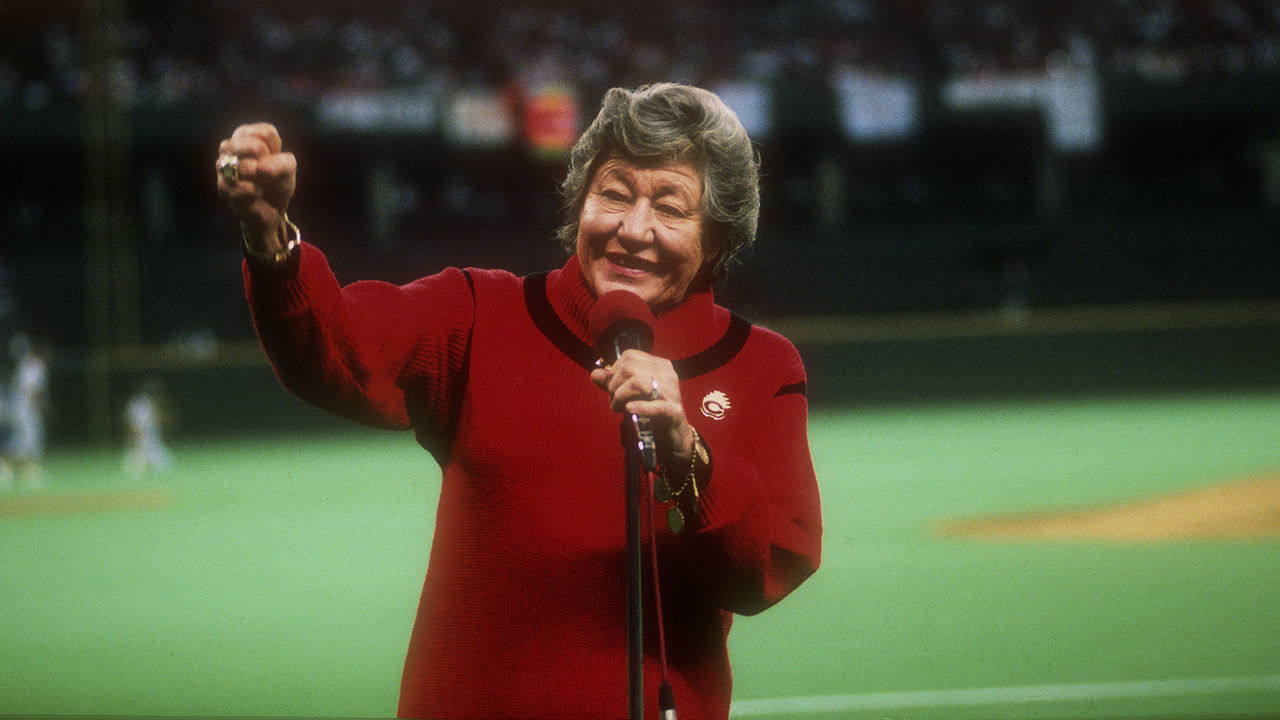 CINCINNATI, OH - OCTOBER 16: Owner the Cincinnati Reds Marge Schott speaks to the fans prior to the start of Game One of the 1990 World Series between the Oakland Athletics and Cincinnati Reds October 16, 1990 at Riverfront Stadium in Cincinnati, Ohio. The Reds swept the Athletics 4-0 in the 1990 World Series.
