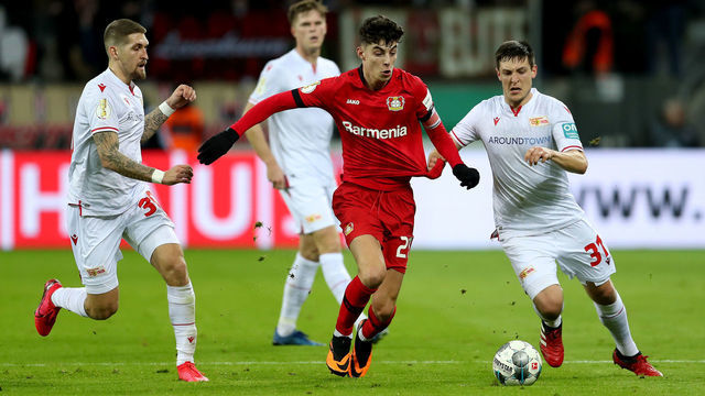 LEVERKUSEN, GERMANY - MARCH 04: Kai Havertz of Bayer 04 Leverkusen battles for the ball with Keven Schlotterbeck of 1.FC Union Berlin during the DFB Cup quarterfinal match between Bayer 04 Leverkusen and 1. FC Union Berlin at BayArena on March 04, 2020 in Leverkusen, Germany.