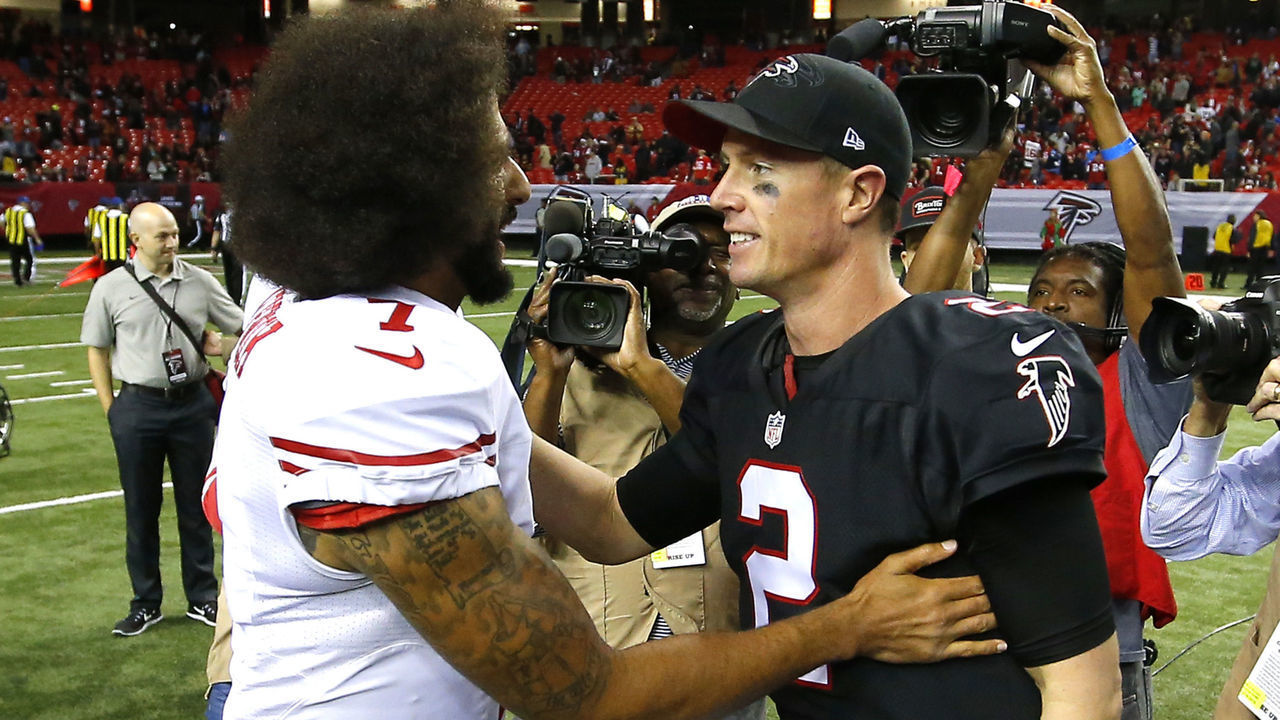 ATLANTA, GA - DECEMBER 18: Atlanta Falcons quarterback Matt Ryan (2) speaks with San Francisco 49ers quarterback Colin Kaepernick (7) at the conclusion of an NFL football game between the San Francisco 49ers and the Atlanta Falcons on December 18, 2016, at Georgia Dome in Atlanta, GA. The Atlanta Falcons defeated the San Francisco 49ers 41-13.