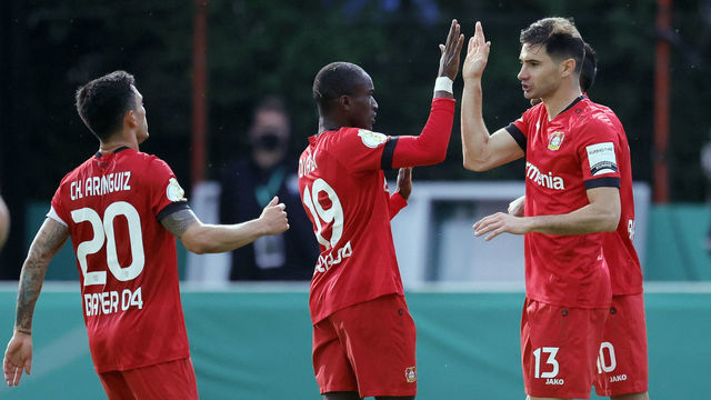 Leverkusen's Italian forward Lucas Alario (R) celebrates with teammates after scoring the 0-2 goal during the German Cup (DFB Pokal) semi-final football match 1 FC Saarbruecken v Bayer 04 Leverkusen in Volklingen, southern Germany on June 9, 2020.