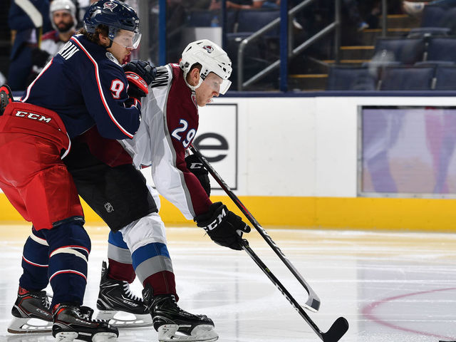 COLUMBUS, OH - OCTOBER 9: Nathan McKinnon #29 of the Colorado Avalanche shields the puck from Artemi Panarin #9 of the Columbus Blue Jackets during the third period of a game on October 9, 2018 at Nationwide Arena in Columbus, Ohio.