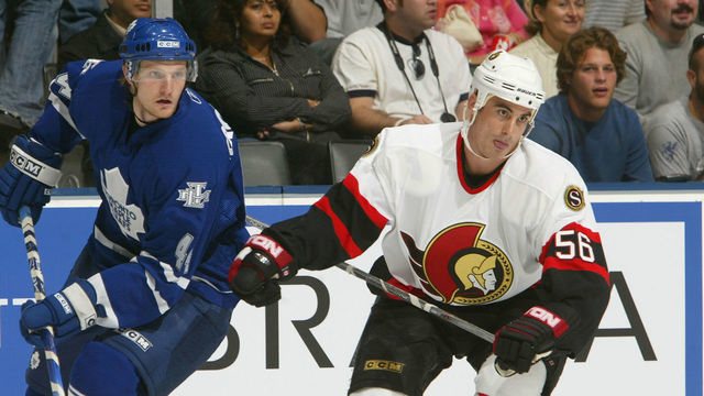 TORONTO - SEPTEMBER 18: Brandon Bochenski #56 of the Ottawa Senators skates alongside with Staffan Kronwall #44 of the Toronto Maple Leafs during the NHL preseason game at the Air Canada Centre September 18, 2005 in Toronto, Ontario. The Senators won the game 5-2.