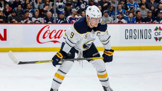 WINNIPEG, MB - MARCH 3: Jack Eichel #9 of the Buffalo Sabres gets set during a second period face-off against the Winnipeg Jets at the Bell MTS Place on March 3, 2020 in Winnipeg, Manitoba, Canada.