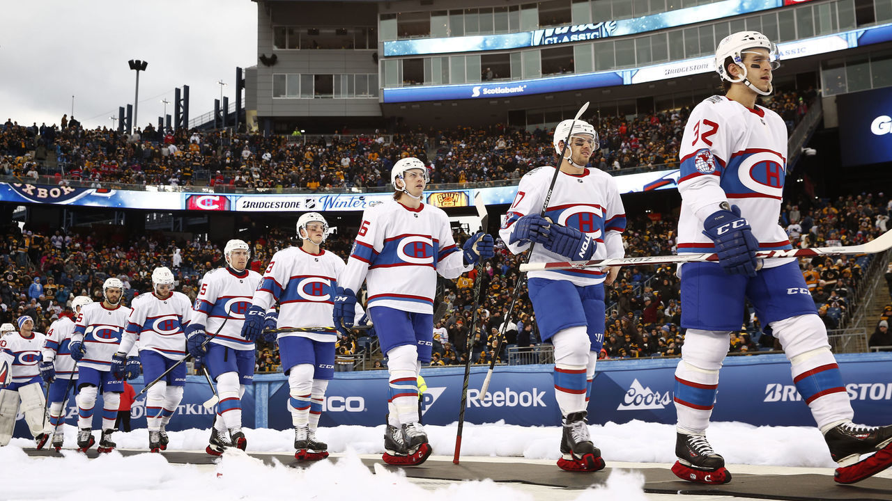 BOSTON, MA - JANUARY 1: The Montreal Canadiens walk out to the ice before the game against the Boston Bruins during the 2016 Bridgestone NHL Winter Classic on January 1, 2016 at Gillette Stadium in Foxboro, Massachusetts.