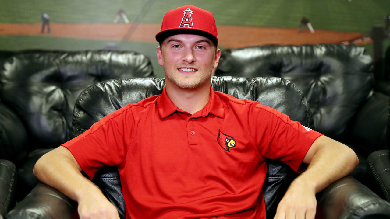SECAUCUS, NJ - JUNE 10: Reid Detmers poses for a photo with an Angels hat after being drafted 10th overall by the Los Angeles Angels during the 2020 Major League Baseball Draft at MLB Network on Wednesday, June 10, 2020 in Secaucus, New Jersey.