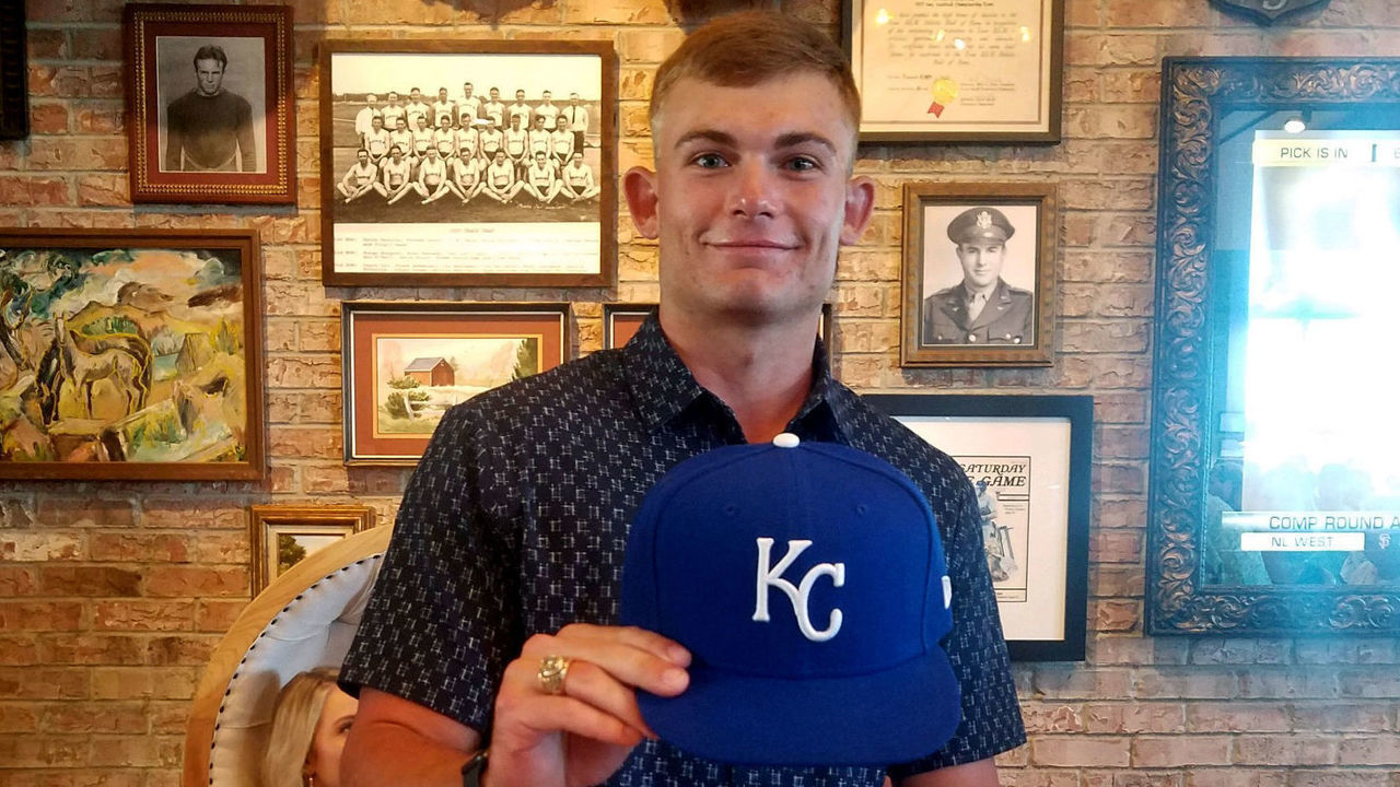 SECAUCUS, NJ - JUNE 10: Asa Lacy poses for a photo with a Royals hat after being drafted fourth overall by the Kansas City Royals during the 2020 Major League Baseball Draft at MLB Network on Wednesday, June 10, 2020 in Secaucus, New Jersey.