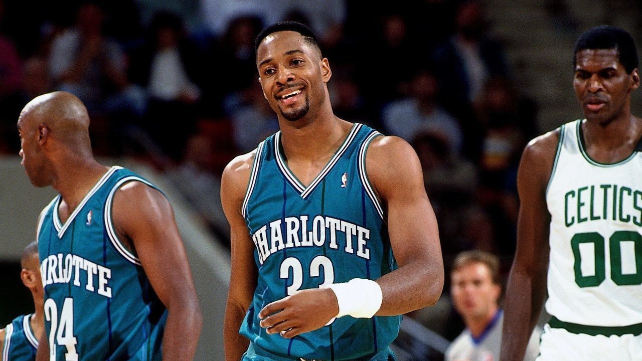 HARTFORD, CT - OCTOBER 21: Alonzo Mourning #33 of the Charlotte Hornets laughs while walking back to play defense against Robert Parish #00 of the Boston Celtics during a game at the Hartford Civic Center on October 21, 1992 in Hartford, Connecticut. NOTE TO USER: User expressly acknowledges that, by downloading and or using this photograph, User is consenting to the terms and conditions of the Getty Images License agreement. Mandatory Copyright Notice: Copyright 1992 NBAE