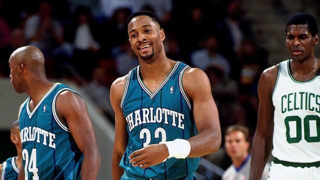 HARTFORD, CT - OCTOBER 21: Alonzo Mourning #33 of the Charlotte Hornets laughs while walking back to play defense against Robert Parish #00 of the Boston Celtics during a game at the Hartford Civic Center on October 21, 1992 in Hartford, Connecticut. NOTE TO USER: User expressly acknowledges that, by downloading and or using this photograph, User is consenting to the terms and conditions of the Getty Images License agreement. Mandatory Copyright Notice: Copyright 1992 NBAE