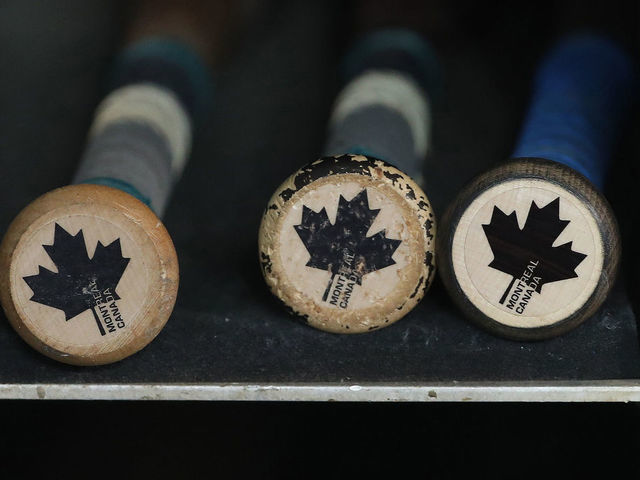 TORONTO, ON - APRIL 1: The Canadian-made bats belonging to Russell Martin #55 of the Toronto Blue Jays rest in the bat rack in the dugout after their victory in MLB game action against the New York Yankees at Rogers Centre on April 1, 2018 in Toronto, Canada. *** Local Caption *** Russell Martin
