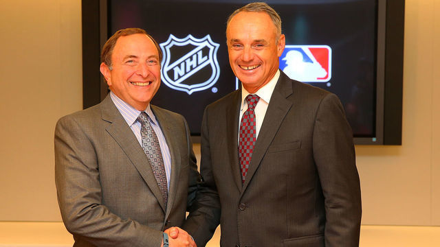 NEW YORK, NY - AUGUST 04: NHL Commissioner Gary Bettman and MLB Commissioner Rob Manfred pose for a photo following a media availability to announce a groundbreaking new partnership between the National Hockey League and Major League Baseball at the NHL Headquarter on August 4, 2015 in New York City.