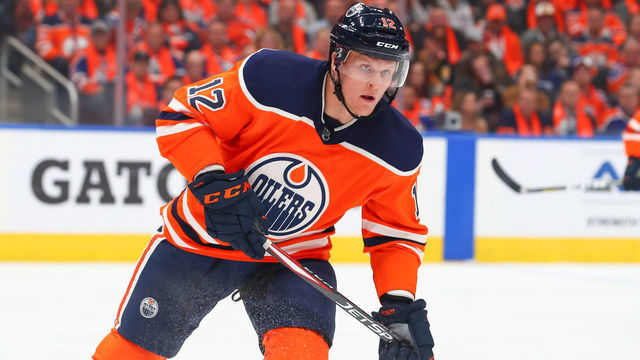 EDMONTON, AB - OCTOBER 02: Edmonton Oilers Center Colby Cave (12) defends his own zone in the first period during the Edmonton Oilers game versus the Vancouver Canucks on October 2, 2019 at Rogers Place in Edmonton, AB.