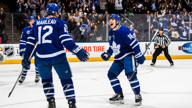 TORONTO, ON - NOVEMBER 10: Patrick Marleau #12 of the Toronto Maple Leafs celebrates his game winning overtime e goal on the Boston Bruins with teammate Mitch Marner at the Air Canada Centre on November 10, 2017 in Toronto, Ontario, Canada.
