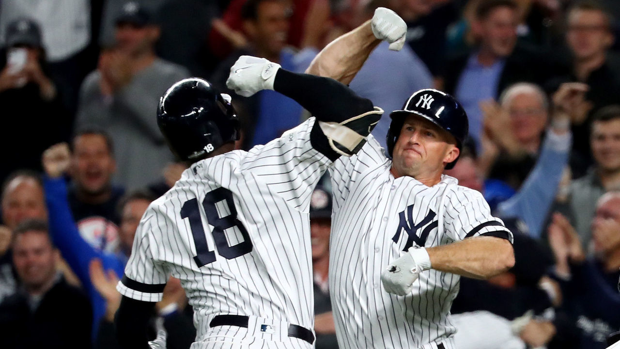 NEW YORK, NY - OCTOBER 03: Didi Gregorius #18 of the New York Yankees celebrates with Brett Gardner #11 after hitting a three run home run against Ervin Santana #54 of the Minnesota Twins during the first inning in the American League Wild Card Game at Yankee Stadium on October 3, 2017 in the Bronx borough of New York City.