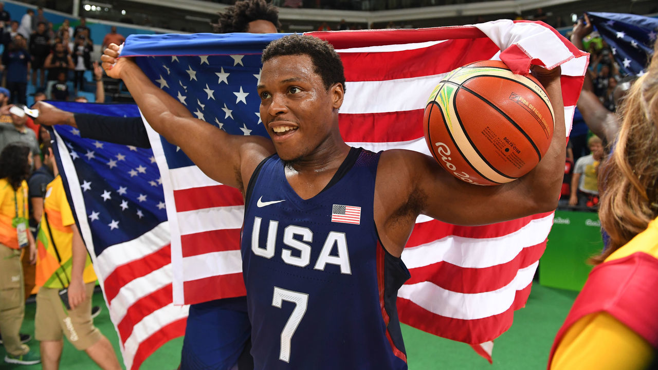 RIO DE JANEIRO, BRAZIL - AUGUST 21: Kyle Lowry #7 of the USA Basketball Men's National Team celebrates after winning the Gold Medal Game against Serbia on Day 16 of the Rio 2016 Olympic Games at Carioca Arena 1 on August 21, 2016 in Rio de Janeiro, Brazil. NOTE TO USER: User expressly acknowledges and agrees that, by downloading and/or using this Photograph, user is consenting to the terms and conditions of the Getty Images License Agreement. Mandatory Copyright Notice: Copyright 2016 NBAE
