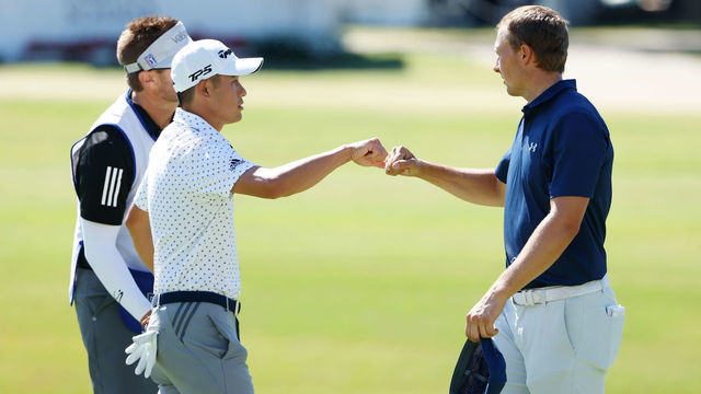 FORT WORTH, TEXAS - JUNE 14: Collin Morikawa of the United States and Jordan Spieth of the United States bump fists after finishing on the 18th green during the final round of the Charles Schwab Challenge on June 14, 2020 at Colonial Country Club in Fort Worth, Texas.