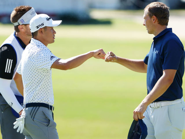 FORT WORTH, TEXAS - JUNE 14: Collin Morikawa of the United States and Jordan Spieth of the United States bump fists after finishing on the 18th green during the final round of the Charles Schwab Challenge on June 14, 2020 at Colonial Country Club in Fort Worth, Texas.