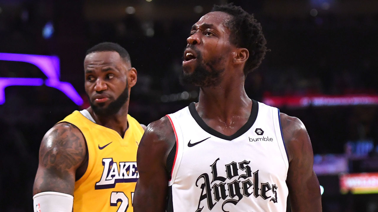 LOS ANGELES, CA - DECEMBER 25: Patrick Beverley #21 of the Los Angeles Clippers looks at the crowd after he blocked a shot by LeBron James #23 of the Los Angeles Lakers in the second half of the game at Staples Center on December 25, 2019 in Los Angeles, California. NOTE TO USER: User expressly acknowledges and agrees that, by downloading and/or using this Photograph, user is consenting to the terms and conditions of the Getty Images License Agreement.