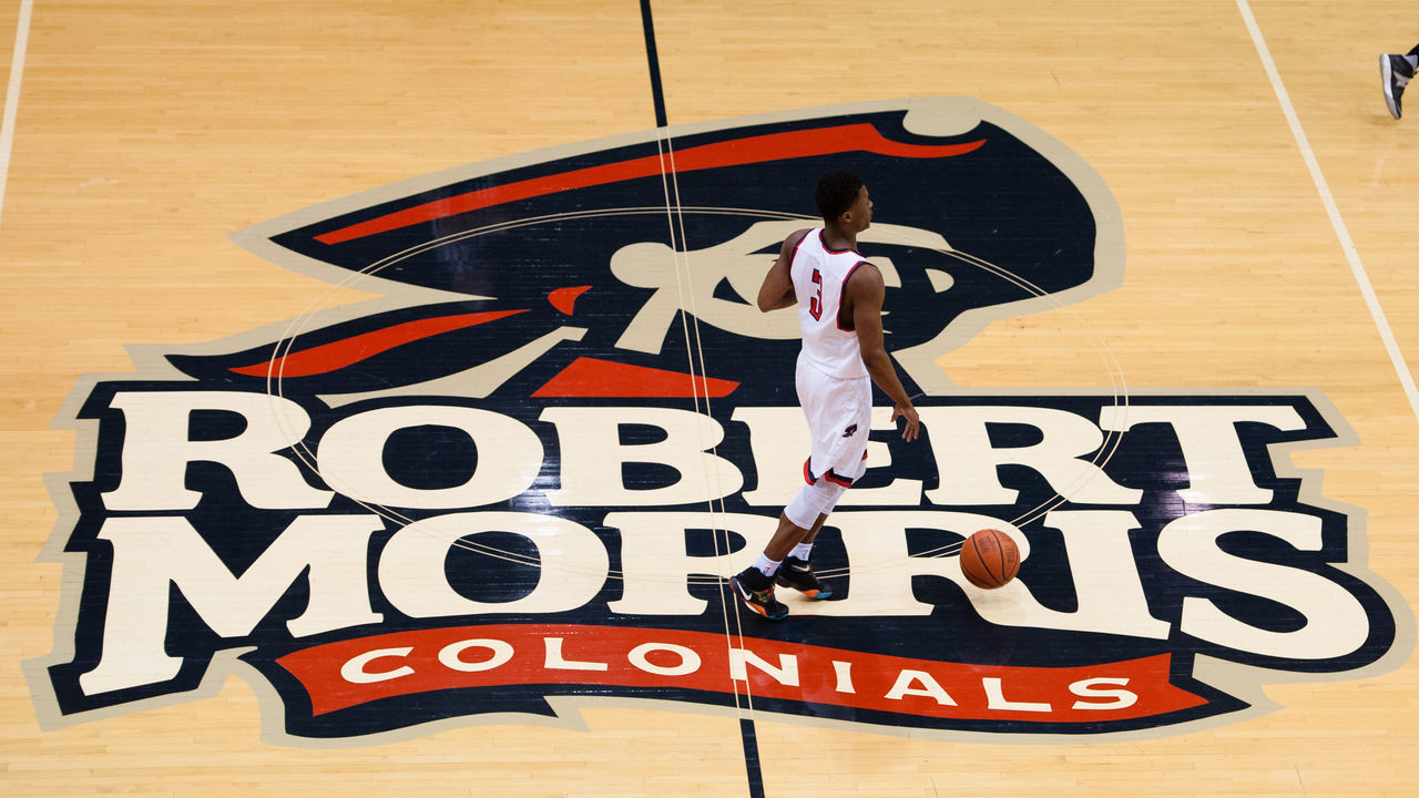 February 6 2016: Robert Morris Colonials guard Kavon Stewart (3) brings the ball up court over the Robert Morris Colonials logo on the floor during the second half in the NCAA Basketball game between the Bryant University Bulldogs and the Robert Morris Colonials at the Charles L. Sewall Center in Moon Township, Pennsylvania
